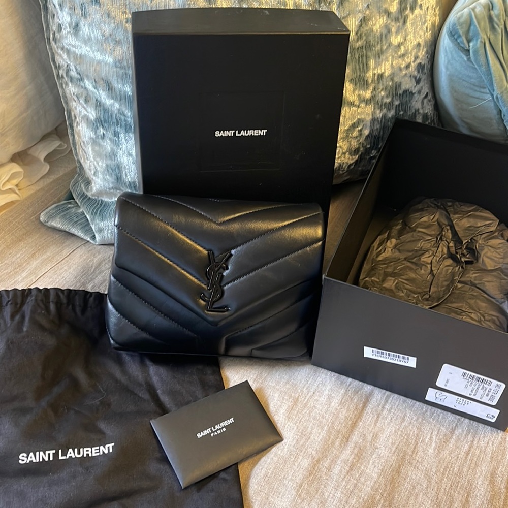 YSL mini bag. Black leather. Box and certificate of authenticity included.